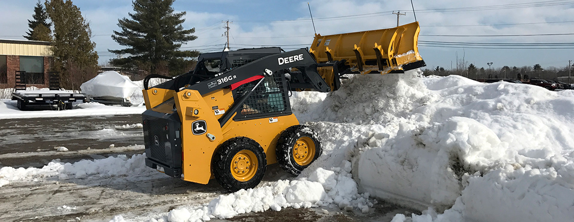 clearing snow in parking lot
